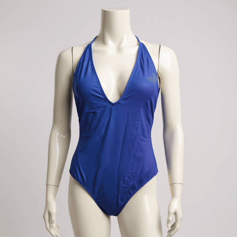 Elegante bañador de una pieza en un vibrante tono azul, con un escote halter y una espalda abiert...