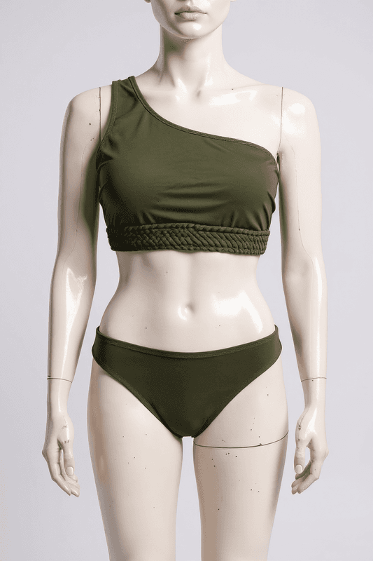 Elegante bikini de dos piezas en verde y negro, con un top de hombro único y unos shorts a juego,...
