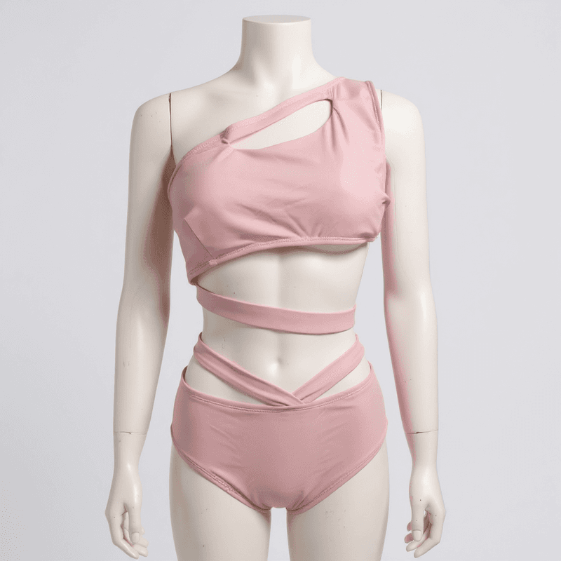 Elegante bikini rosa pálido de dos piezas con diseño asimétrico y cintura alta, perfecto para luc...
