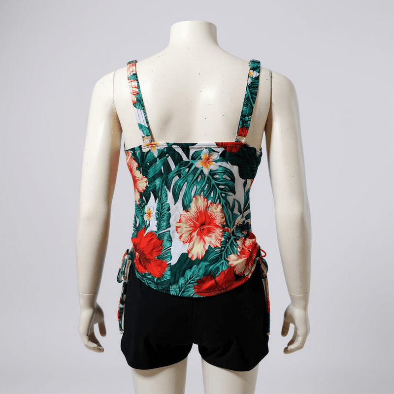 Conjunto de tankini estampado con motivos tropicales en tonos vibrantes, ideal para lucir un look...