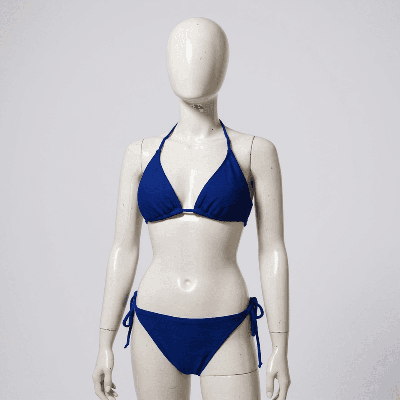 Elegante conjunto de bikini de dos piezas en un tono azul marino profundo, con un top de tirantes...